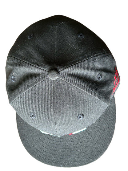 Black and white snapback hat with red pulse